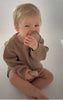 US stockist of Illoura the Label's gender neutral, Tallow Romper knitted romper in Chocolate.