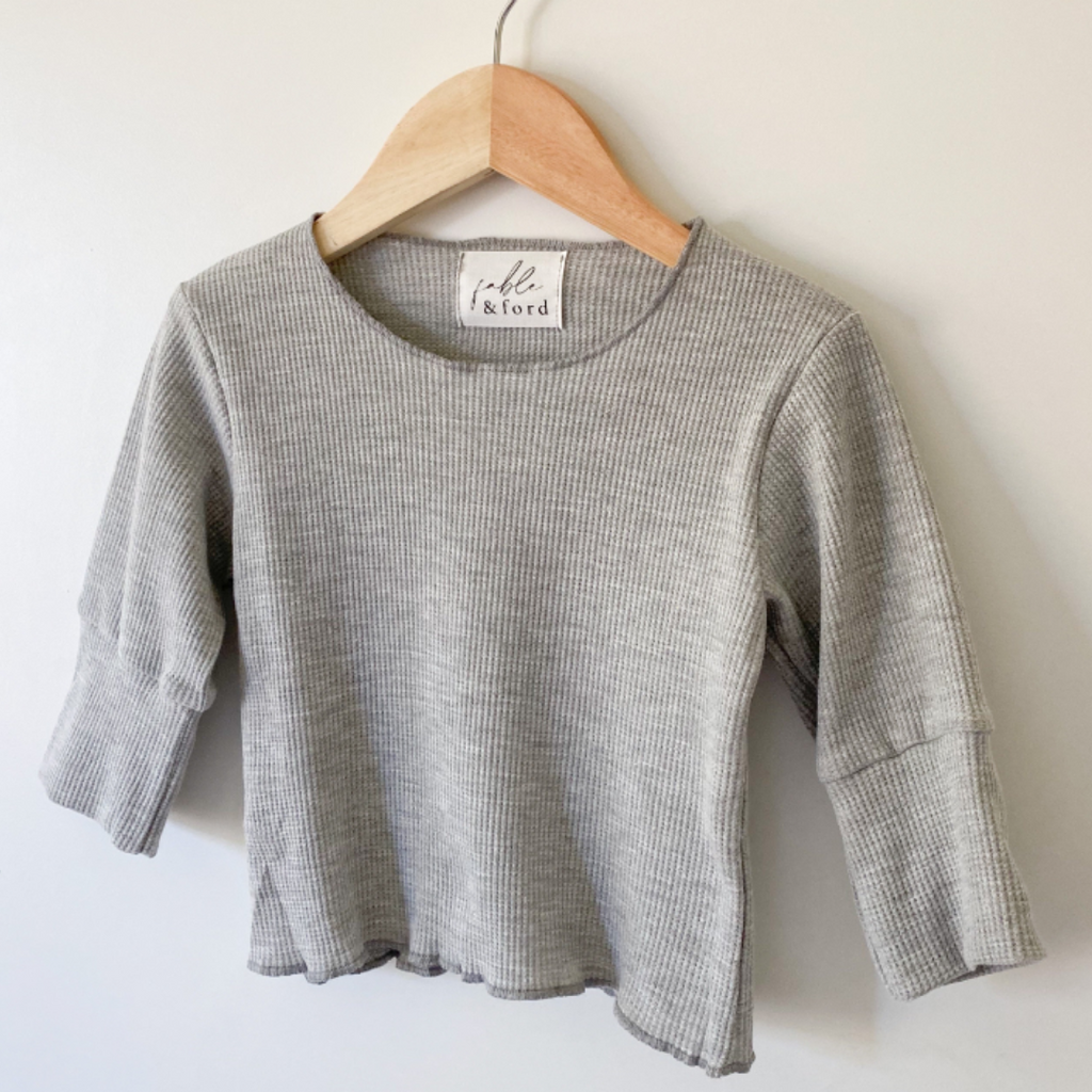 US stockist of Fable & Ford's long sleeve, gender neutral waffle top.  Made from soft 100% cotton in grey.