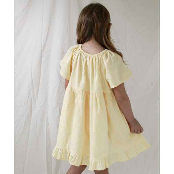 US stockist of Daughter's cotton Petal Dress in Sorbet Yellow.
