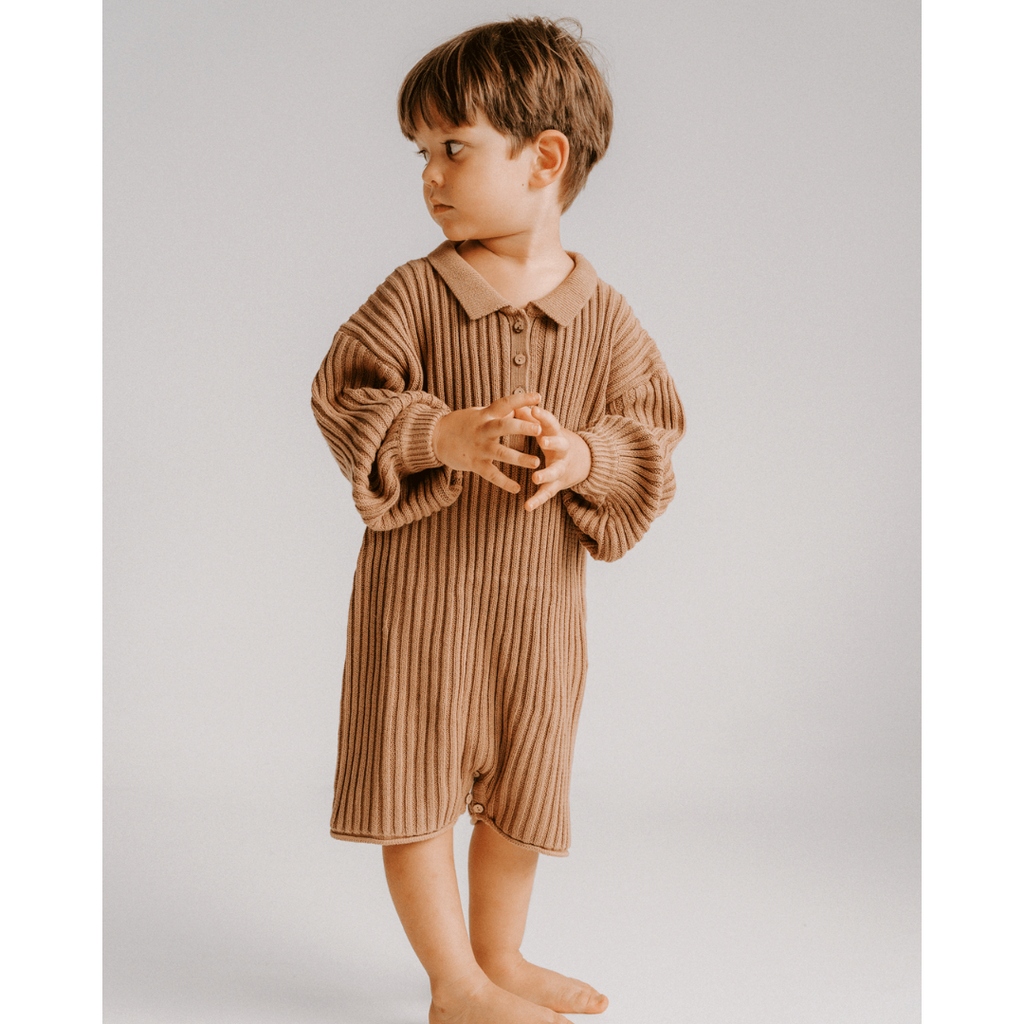 US stockist of Illoura the Label's gender neutral, Essential Knit Romper in Chocolate.  Made from 100% rib cotton with coconut buttons on placket and a collar.