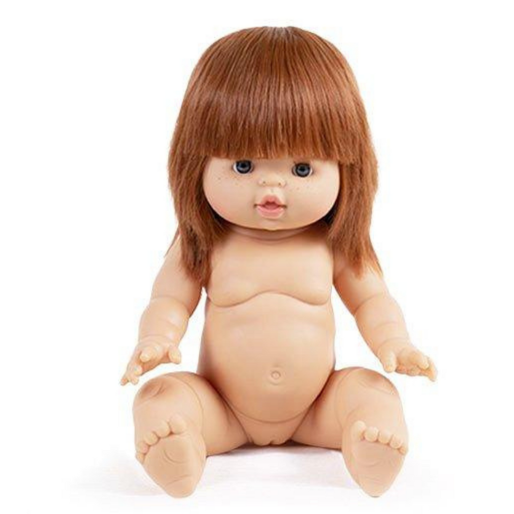 US stockist of Minikane's "Capucine" girl doll.  Measures 13" in height and has moveable limbs.  Anatomically correct and features straight red hair with bangs, white skin and blue/grey eyes.