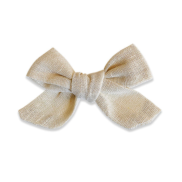 US stockist of Josie Joan's Wendy classic bow clip.  Made from cotton/linen in a neutral off white shade.