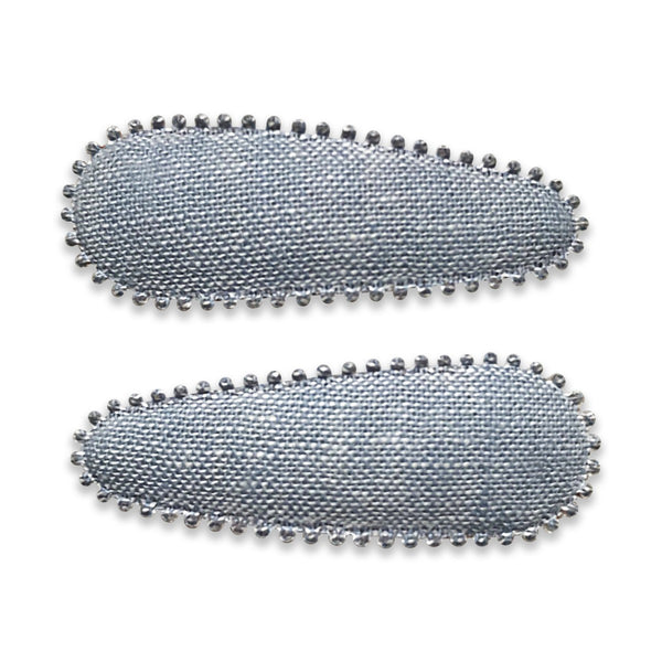 US stockist of Josie Joan's Xanthe fabric hair clips.  Comes in a set of two. Grey/Blue fabric with scalloped edge finish.