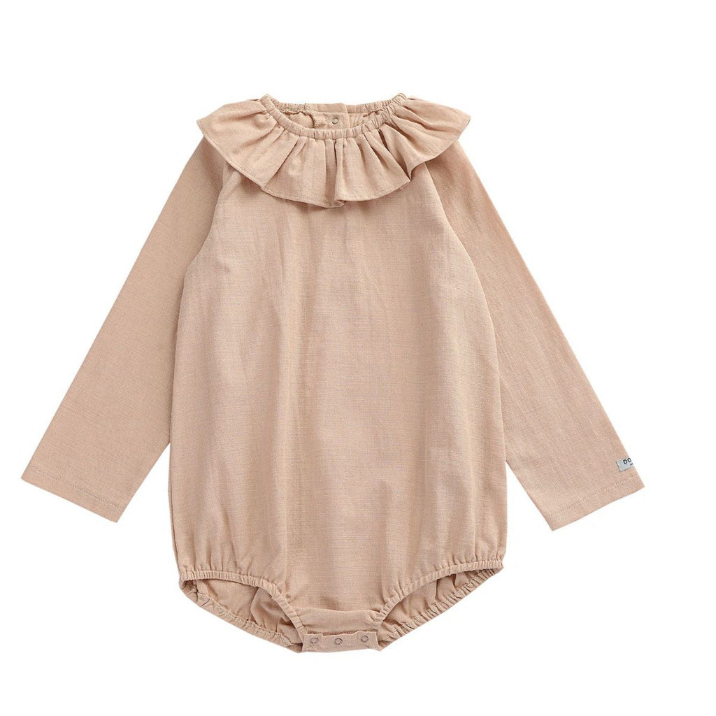 US stockist of Donsje's long sleeve chloe bodysuit in Crystal Pink.  Made from cotton with a ruffle neck.