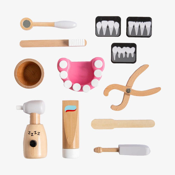 US stockist of Make Me Iconic's 12 piece wooden pretend play dentist kit.  Contains a mouth model, x rays, toothpaster, drill and more.