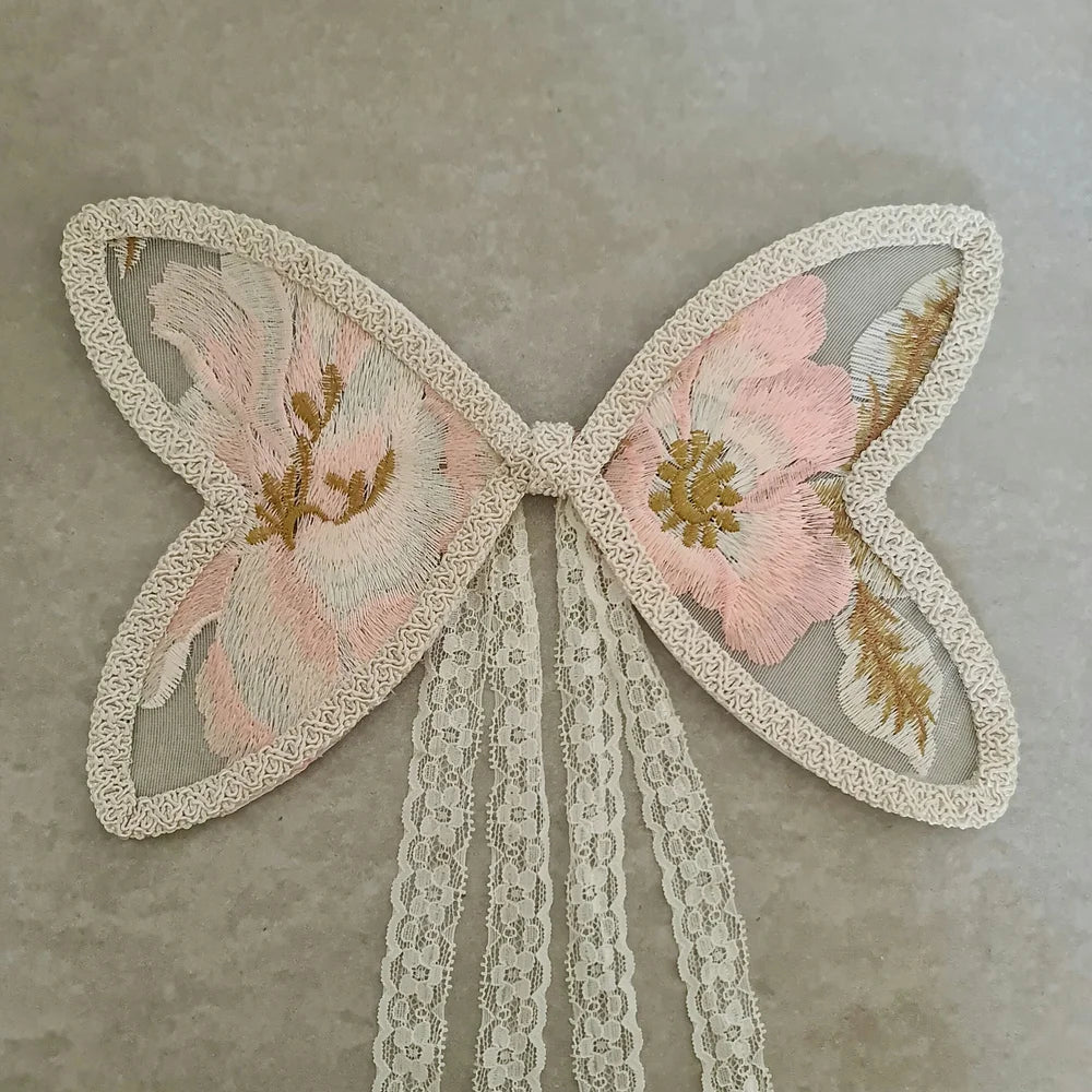 US stockist of Mauve & May's Peony Fairy Wings in size small.