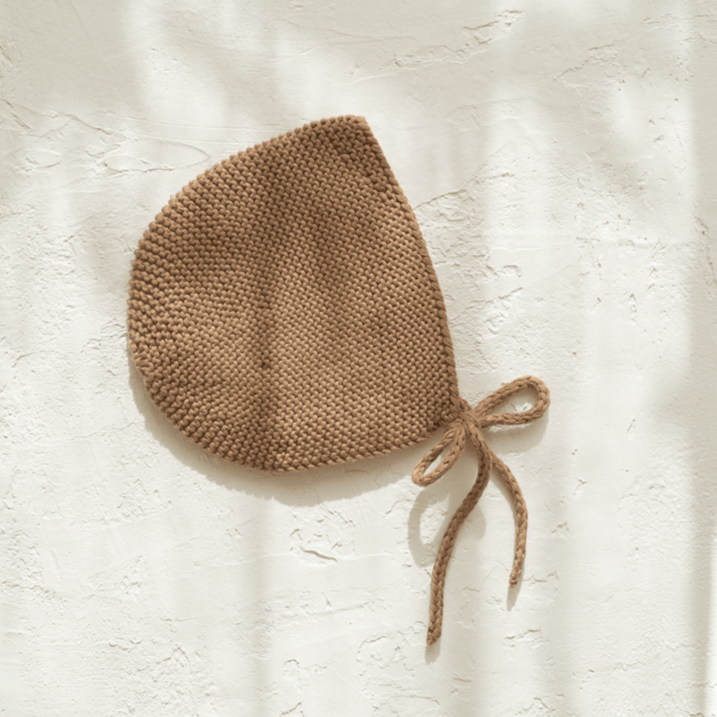 US stockist of Illoura the Label's gender neutral, organic knit Alba bonnet in Chocolate.
