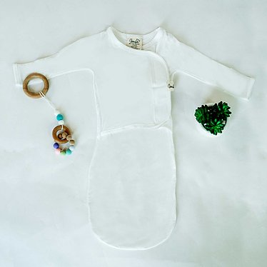Stockist of Bonsie's rayon blend baby gown in gender neutral milk.  Features cross over velcro top that can be undone for skin to skin.  Elastic waist which can be pulled down for easy diaper changes.