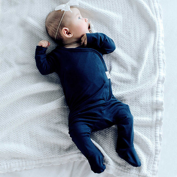 Stockist of Bonsie's rayon blend midnight blue footie.  Top section has velcro wrap body which can be undone for skin to skin contact.  Elastic waist that can be pulled down for easy diaper changes. 