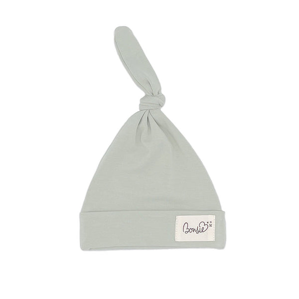 Stockist of Bonsie's rayon blend avocado green knotted baby hat. 