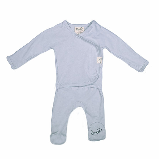 Stockist of Bonsie's rayon blend mist light grey footie.  Top section has velcro wrap body which can be undone for skin to skin contact.  Elastic waist that can be pulled down for easy diaper changes. 