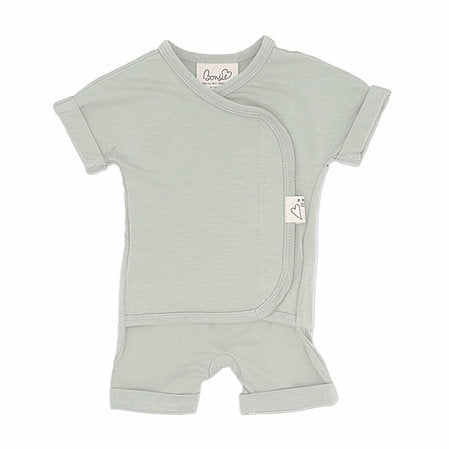 Stockist of Bonsie's rayon blend avocado green short sleeve romper.  Top section has velcro wrap body which can be undone for skin to skin contact.  Elastic waist that can be pulled down for easy diaper changes. 