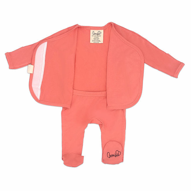 Stockist of Bonsie's rayon blend Burnt Coral footie.  Top section has velcro wrap body which can be undone for skin to skin contact.  Elastic waist that can be pulled down for easy diaper changes. 