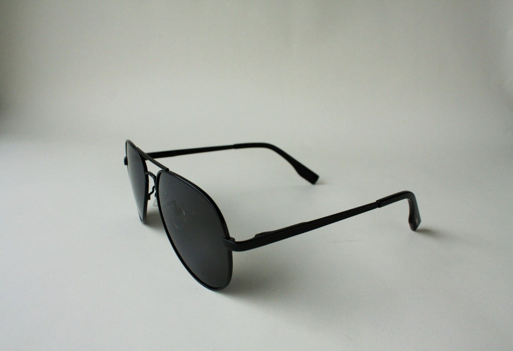 US stockist of Elle Porte's Flynn sunglasses.  Gender neutral aviator style with black frames and dark lenses.  Rated UV400