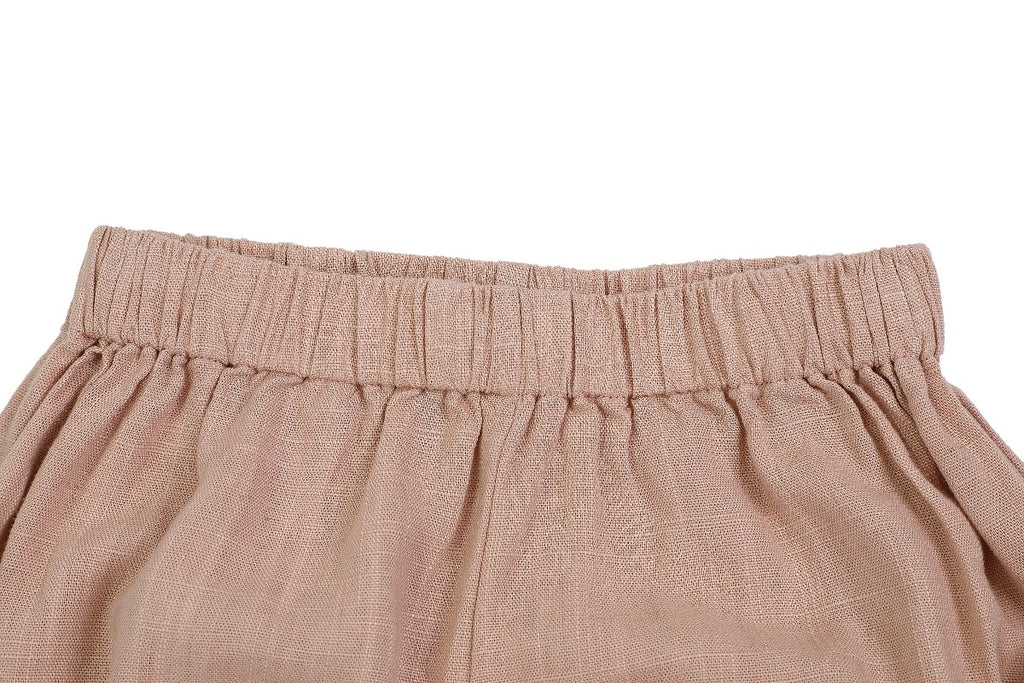 US stockist of Donsje's linen blend, Gwenda Bloomers in Vintage Pink.  Features a ruffle hem.