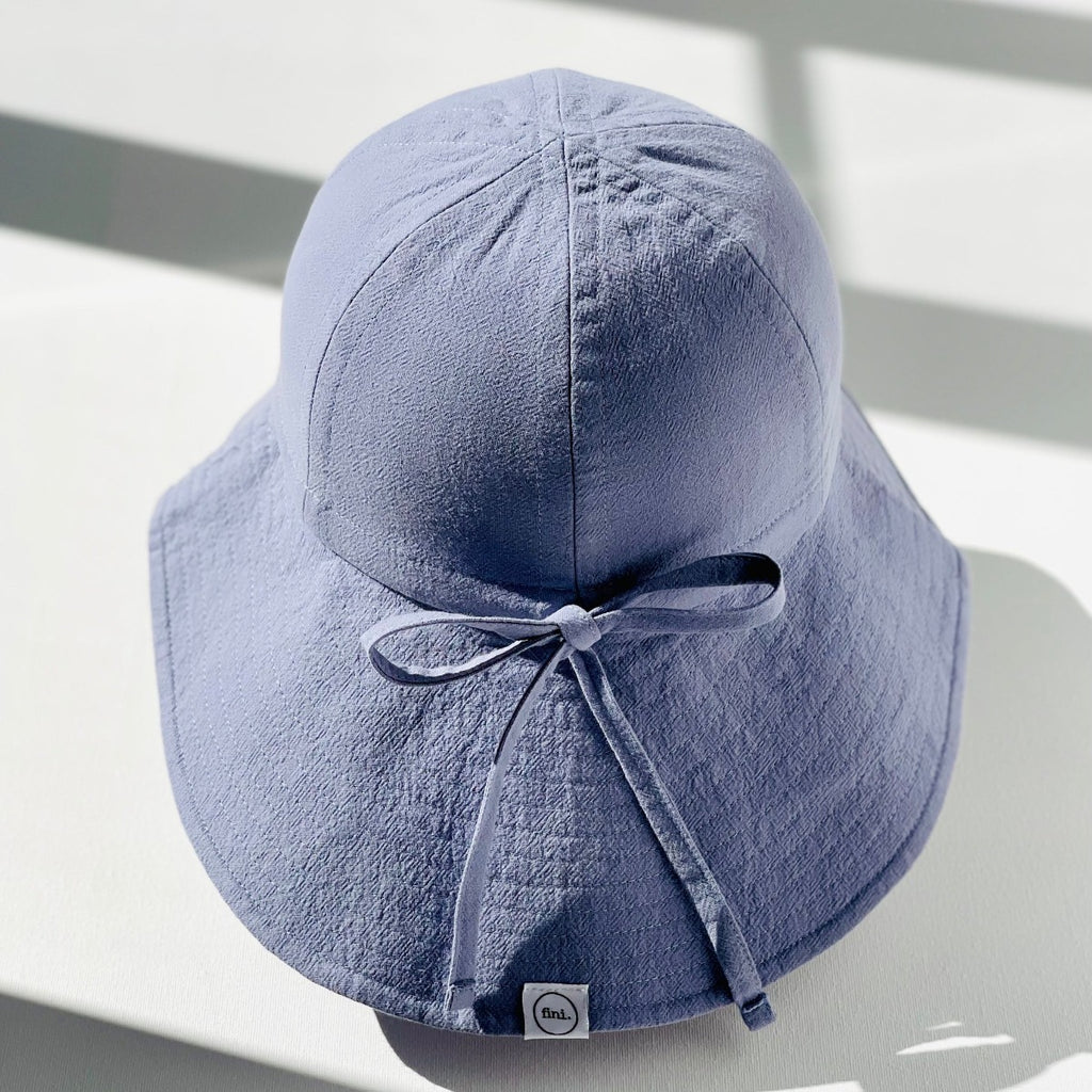 US stockist of Fini. the Label's soft cotton Floppy hat in Eventide.