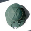US stockist of Fini the Label's gender neutral, floppy swim hat in Ivy Green. Features elongated back for added sun protection, chin strap and adjustable bow around crown for better fit. Brim is medium stiffness and can be flipped up at front.  Made from nylon/spandex and is quick drying.