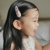 US stockist of Josie Joan's set of two "Stella" hair clips.
