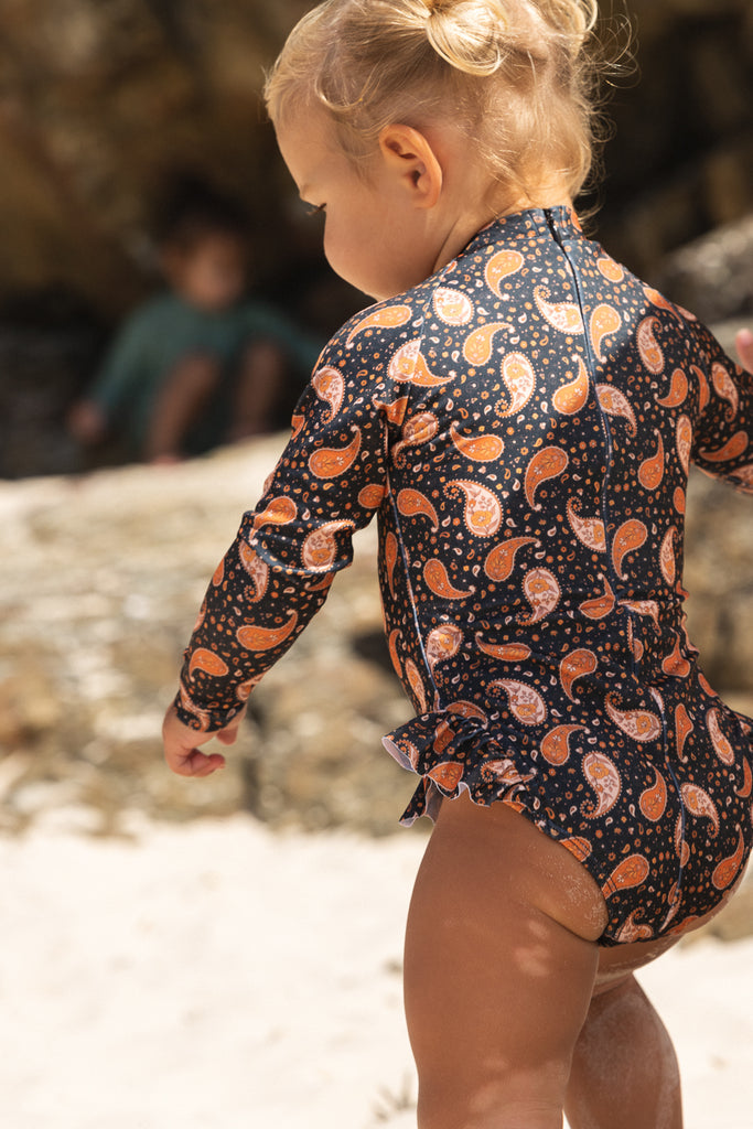 US stockist of Salty Swimwear's long sleeve rashsuit in Midnight Pretty Paisley.  Made from UPF 50+ Repreve fabric.