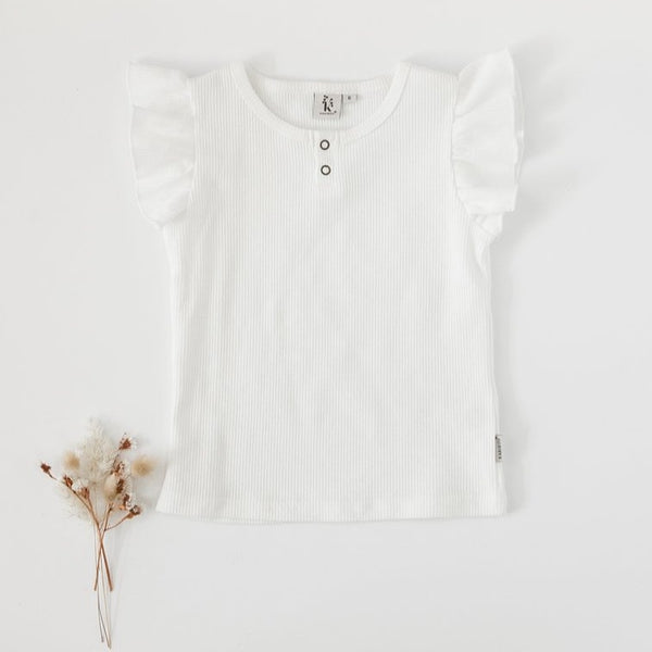 US stockist of Karibou Kids Keira Flutter Sleeve Waffle top in whipped cream.  Made from a soft cotton and spandex blend.