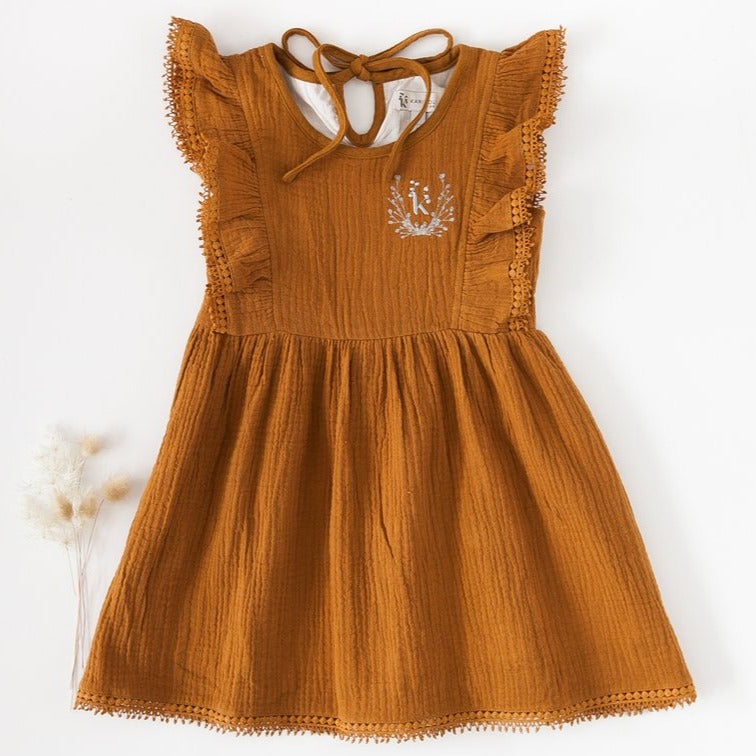 US stockist of Karibou Kids Little Angel Cotton & Lace Dress in Antique Gold.