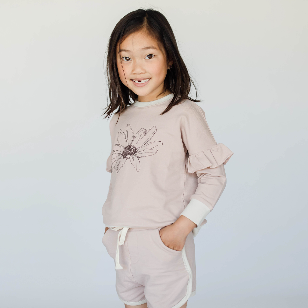 US stockist of Buck & Baa's organic terry cotton sweatshirt.  Shadow pink color with daisy print on front.