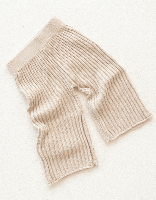 US stockist of Illoura the Label's 3/4 length rib essential knit pants in Biscuit.  Made from cotton with a slight flare.