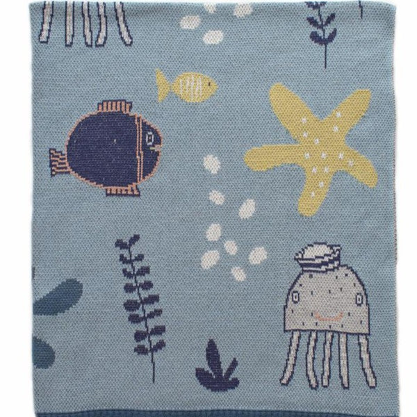 US stockist of Indus Design's "Under the Sea" blue cotton baby blanket.  Features a print with fish, starfish and octopus.  