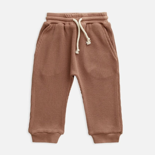 US stockist of Miann & Co's butterscotch baby waffle pants.  Made from 100% waffle cotton with slight drop crotch and functional drawstring with elastic waist.