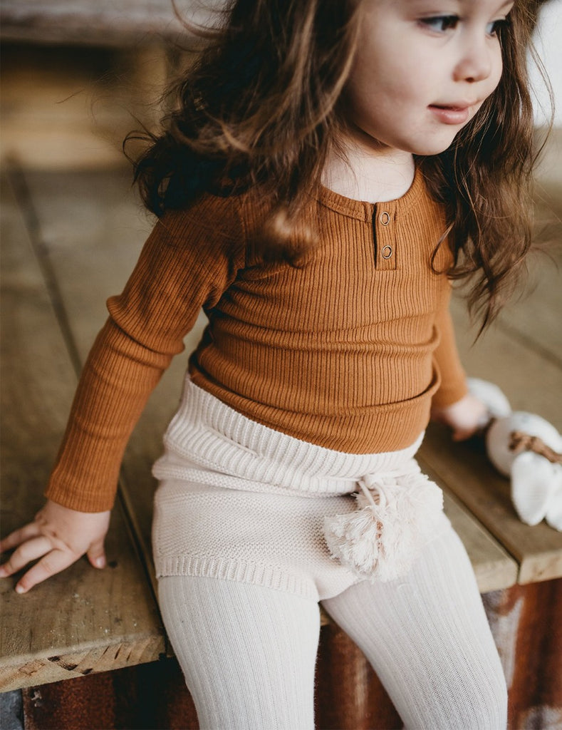 US stockist of Karibou Kids gender neutral, antique gold Willow ribbed long sleeve top